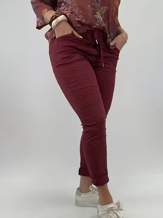 Superjoustavat housut viininpunainen