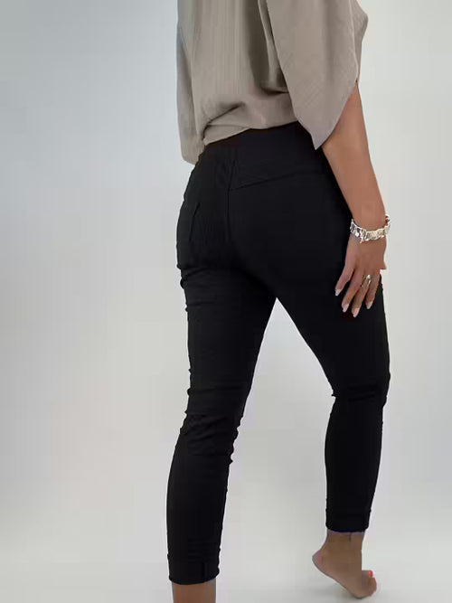 Lataa kuva 1. Superjoustavat housut musta