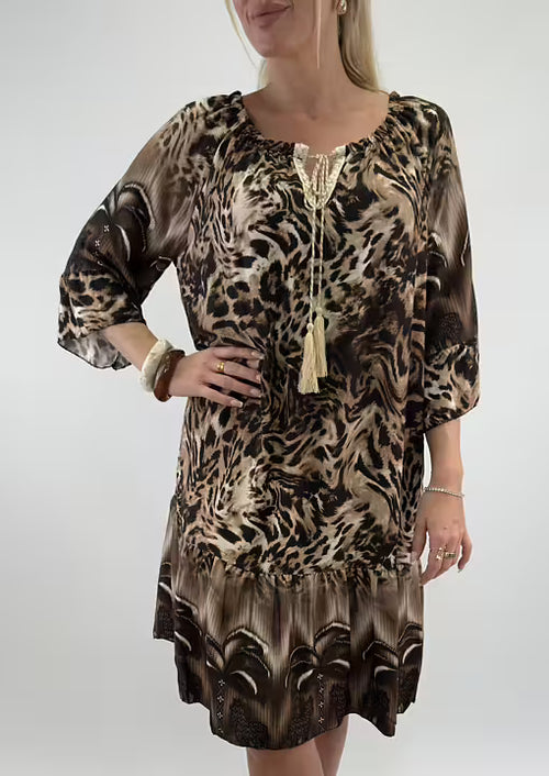 Lataa kuva 1. Leo kuosinen joustava mekko hapsuilla