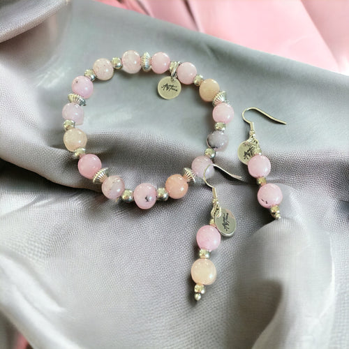 Lataa kuva 1. Käsirengas ja korvakorut Kirsikankukka