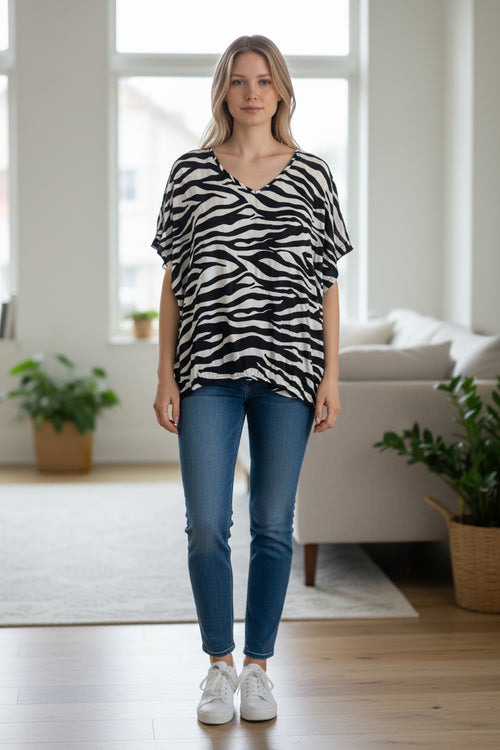 Lataa kuva 1. KAamber eläinkuosinen paita